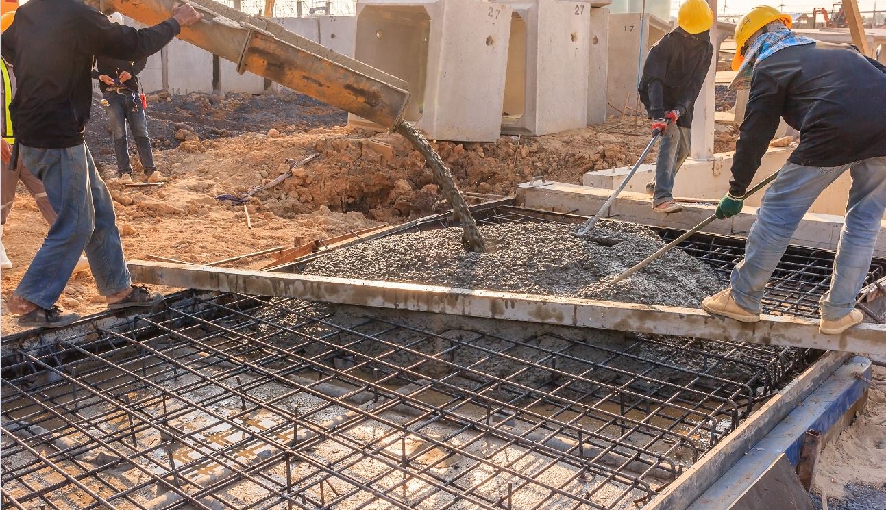 Image of workers pouring self-consolidating concrete